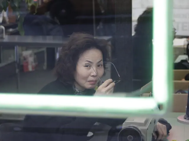 Empowerment Through Stitching: One Woman's Journey Overcoming Disability to Establish a Career in...