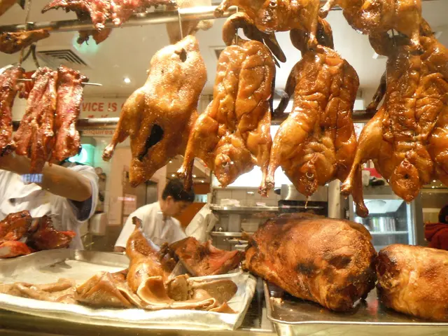 At the top of the image there are many chicken pieces hanging on the rod. At the bottom of the...