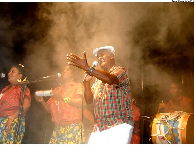 This picture describes about group of people and they are all musicians. In the middle of the image...